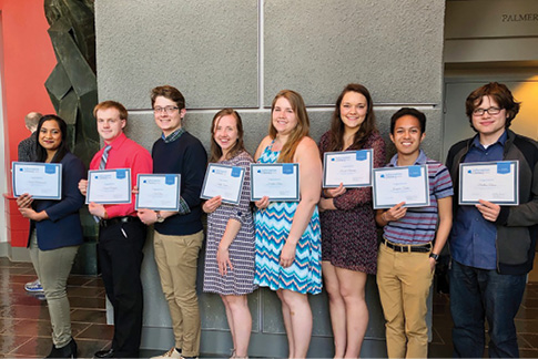 Penn State students Sarah Mohammed, Seamus Wagner, Sean Clees, Emily Seiger, Heather Bair, Rachel Bruning, Joaquim Santos, and Matthew Adams (left to right) were among 74 students to receive Information Literacy Awards from the University Libraries in 2018. Image: Penn State University Libraries.
