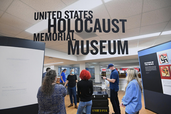 University of Mississippi museum studies students help assemble the exhibit space