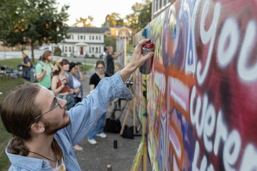 Tanner Valachovic participates in the aerosol art workshop