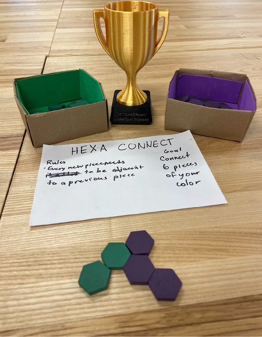 Figure 2. The winning game and the 3D printed trophy.