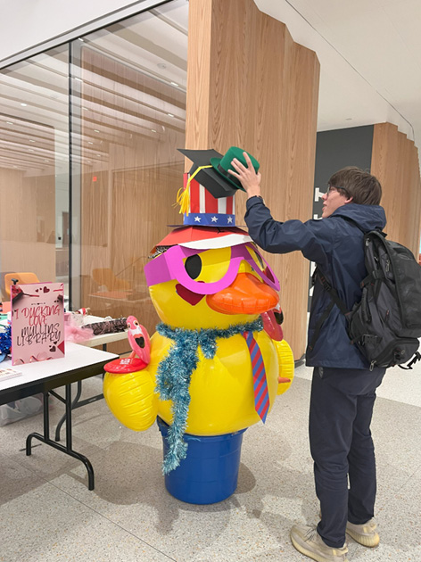 Sheldon with a student.